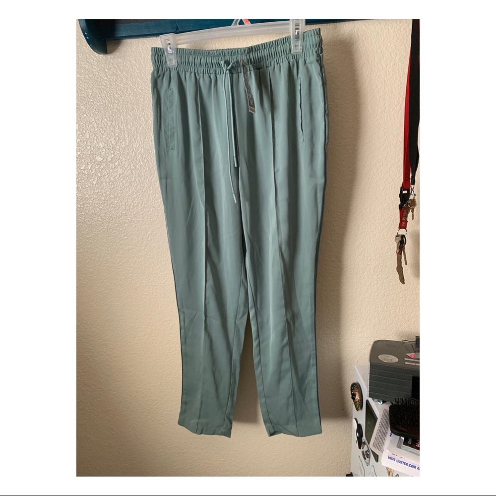 Slim green track pants